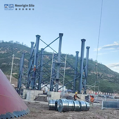 如何在工业场地安装储存载氟氧化铝的螺旋式钢筒仓？